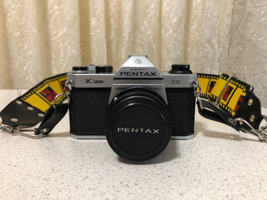 Pentax K1000 35mm SLR Film Camera Kit w/50mm Lens, Pentax Camera Cover, Vivitar 3500 Flash